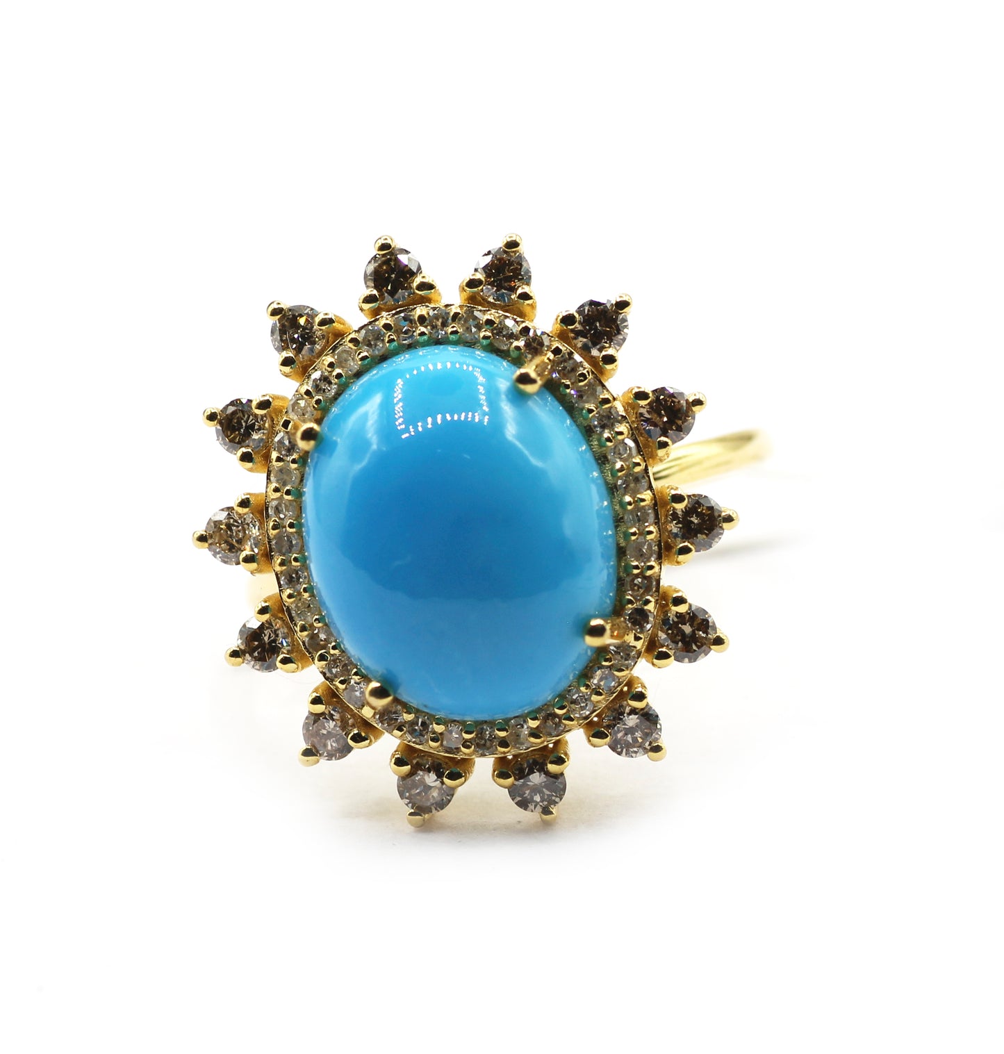 Ring with a blue gemstone and gold accents on a white background