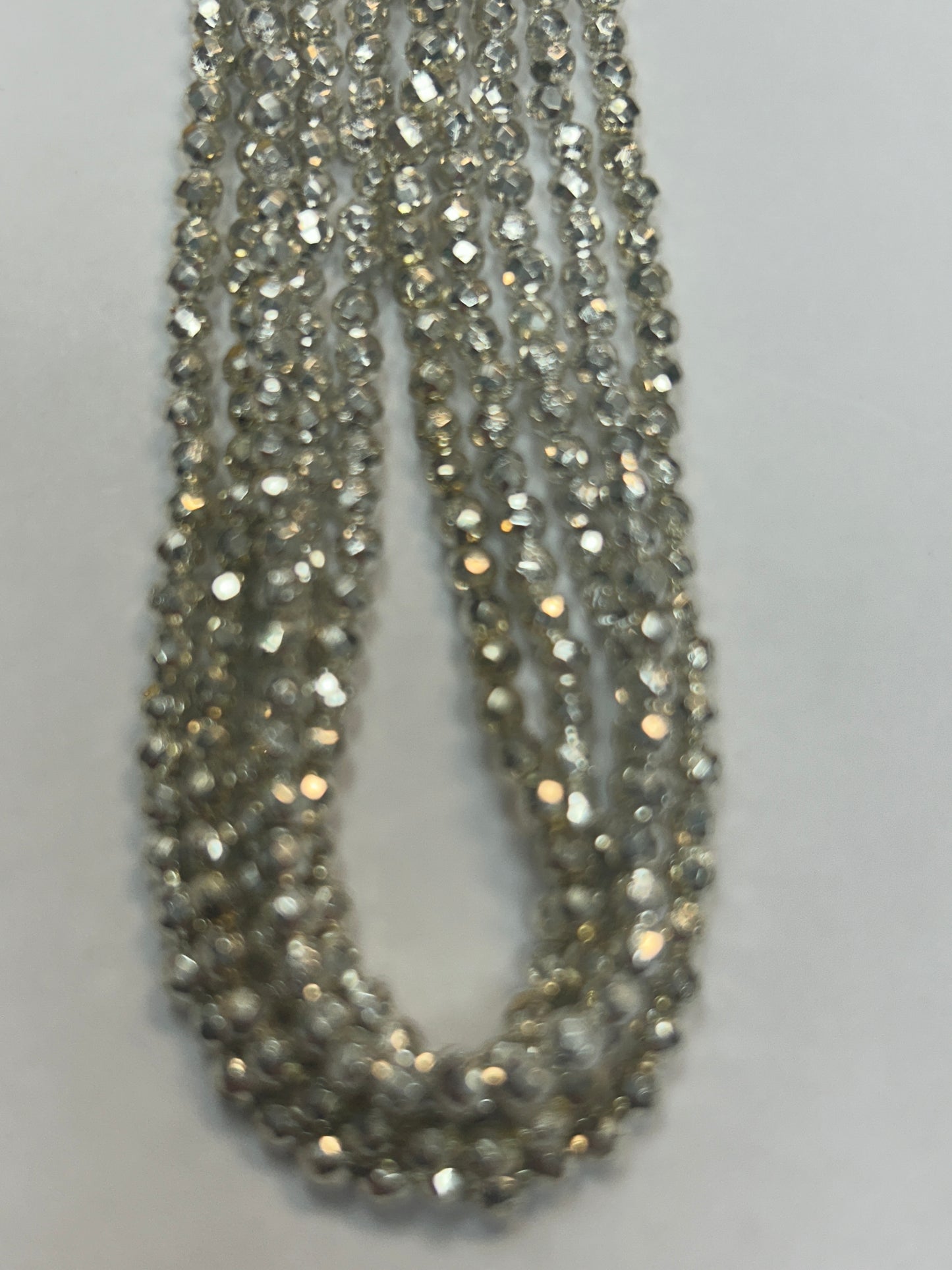 PYRITE COATED ROUND FACETED 3-4MM