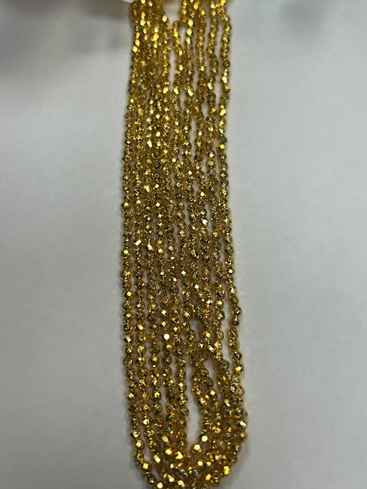 PYRITE COATED ROUND FACETED 3-4MM