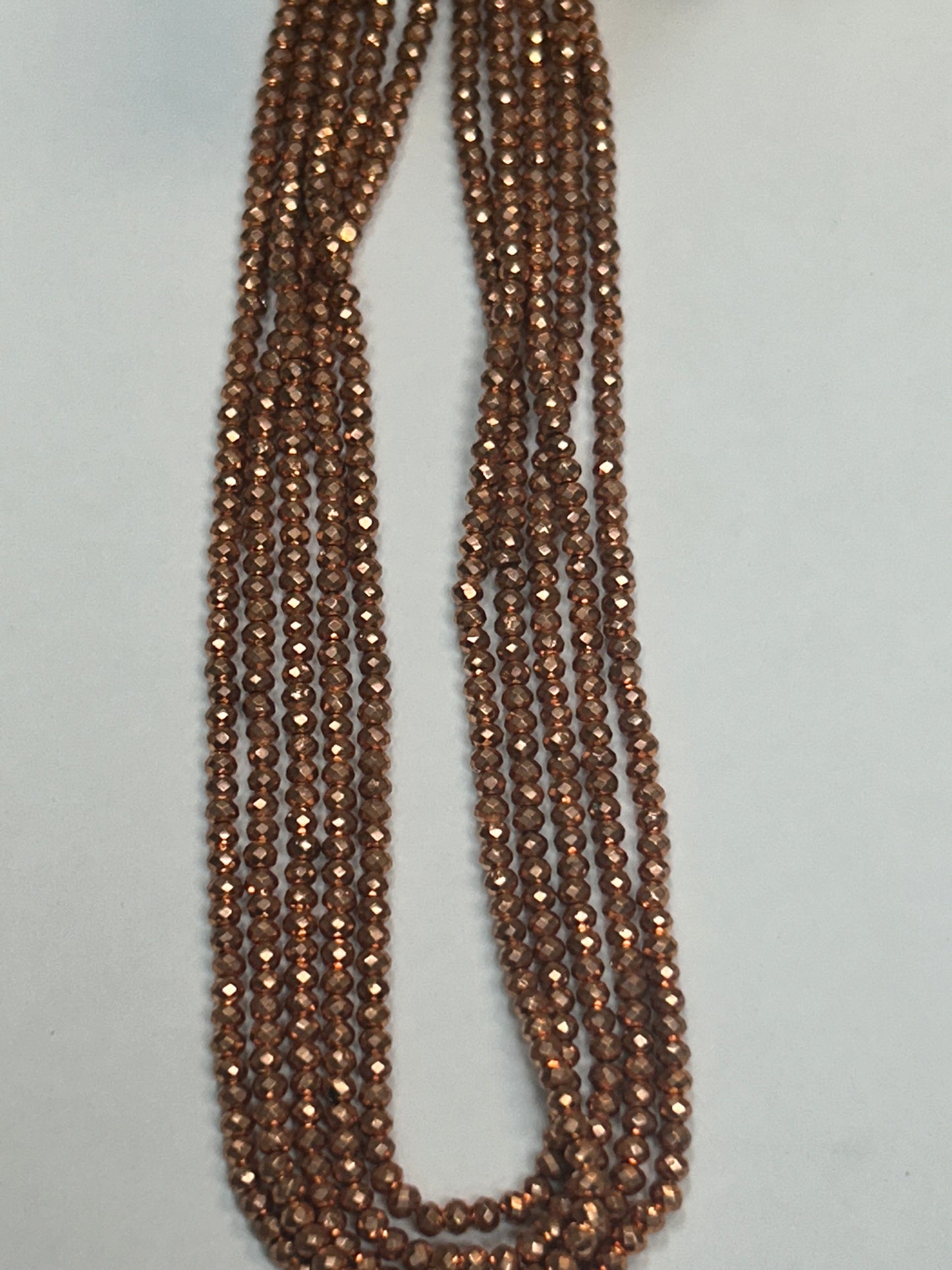 PYRITE COATED ROUND FACETED 3-4MM