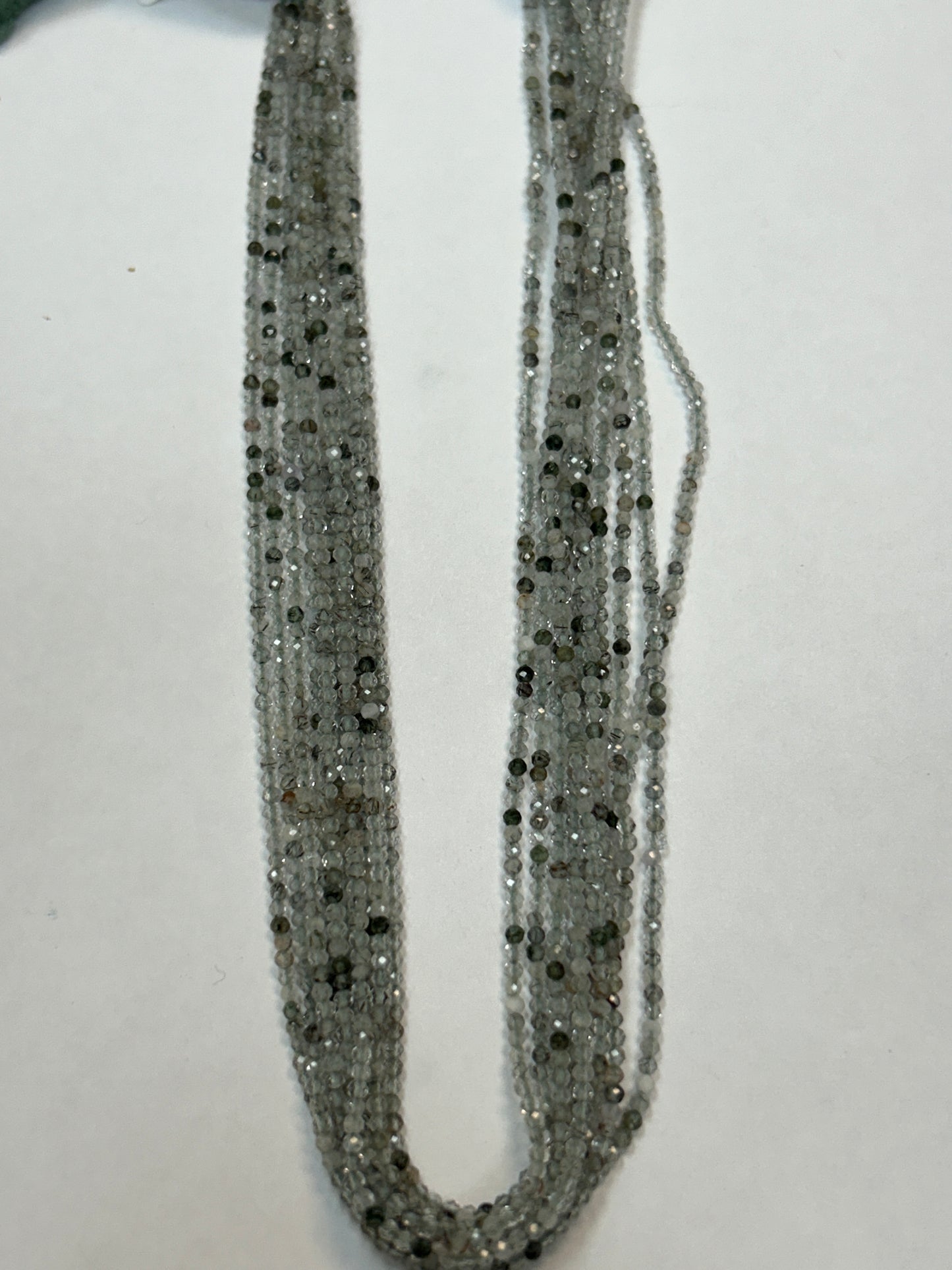 GREEN ROUTILATED QUARTZ ROUND FACETED 2-3mm