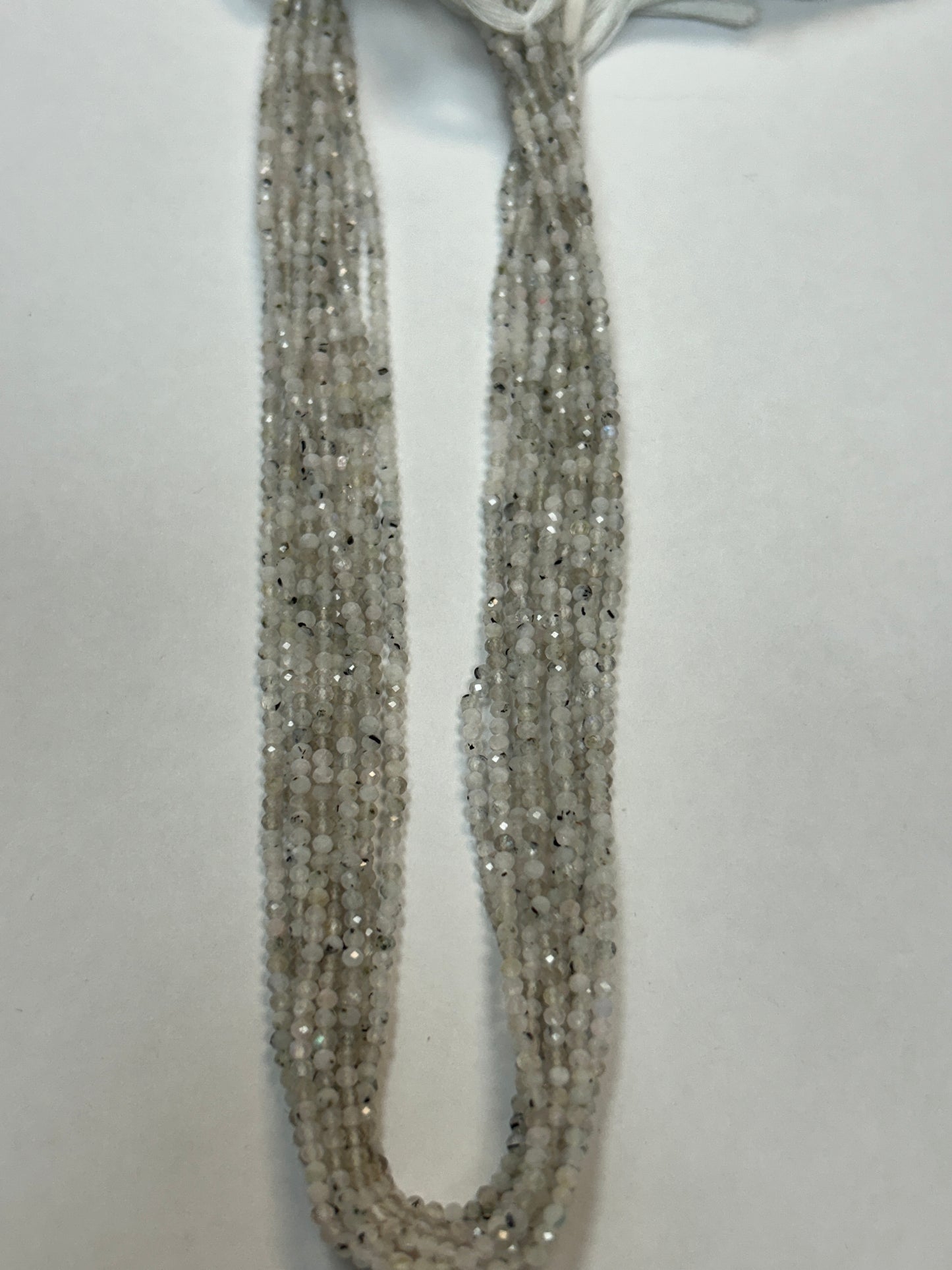 RAINBOW MOONSTONE ROUND FACETED 2-3mm