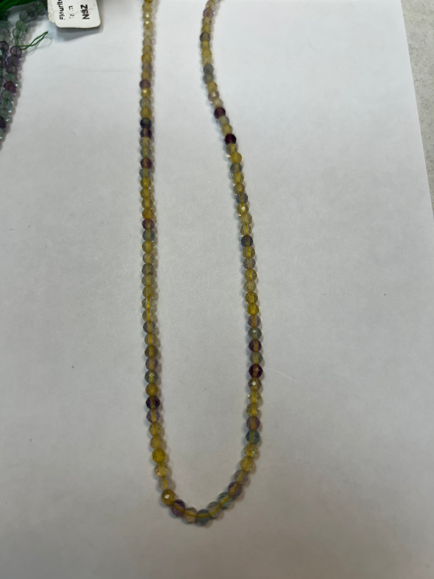 FLOURITE ROUND FACETED 3-4MM