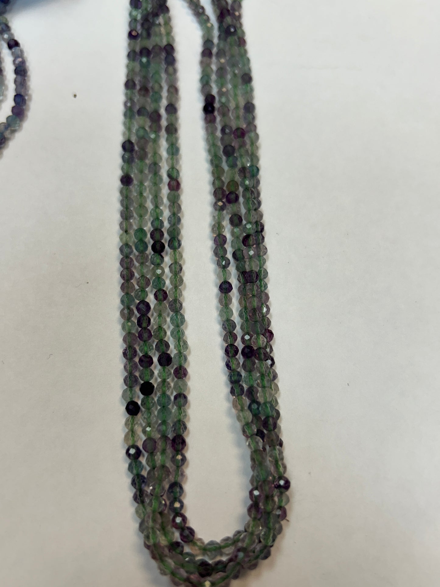 FLOURITE ROUND FACETED 3-4MM