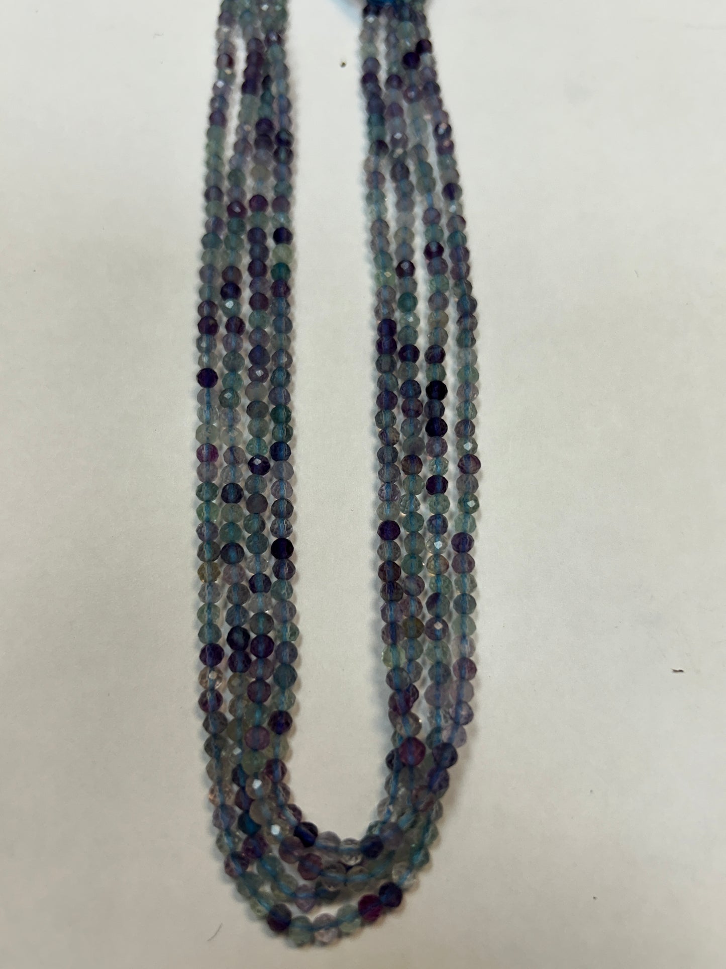 FLOURITE ROUND FACETED 3-4MM