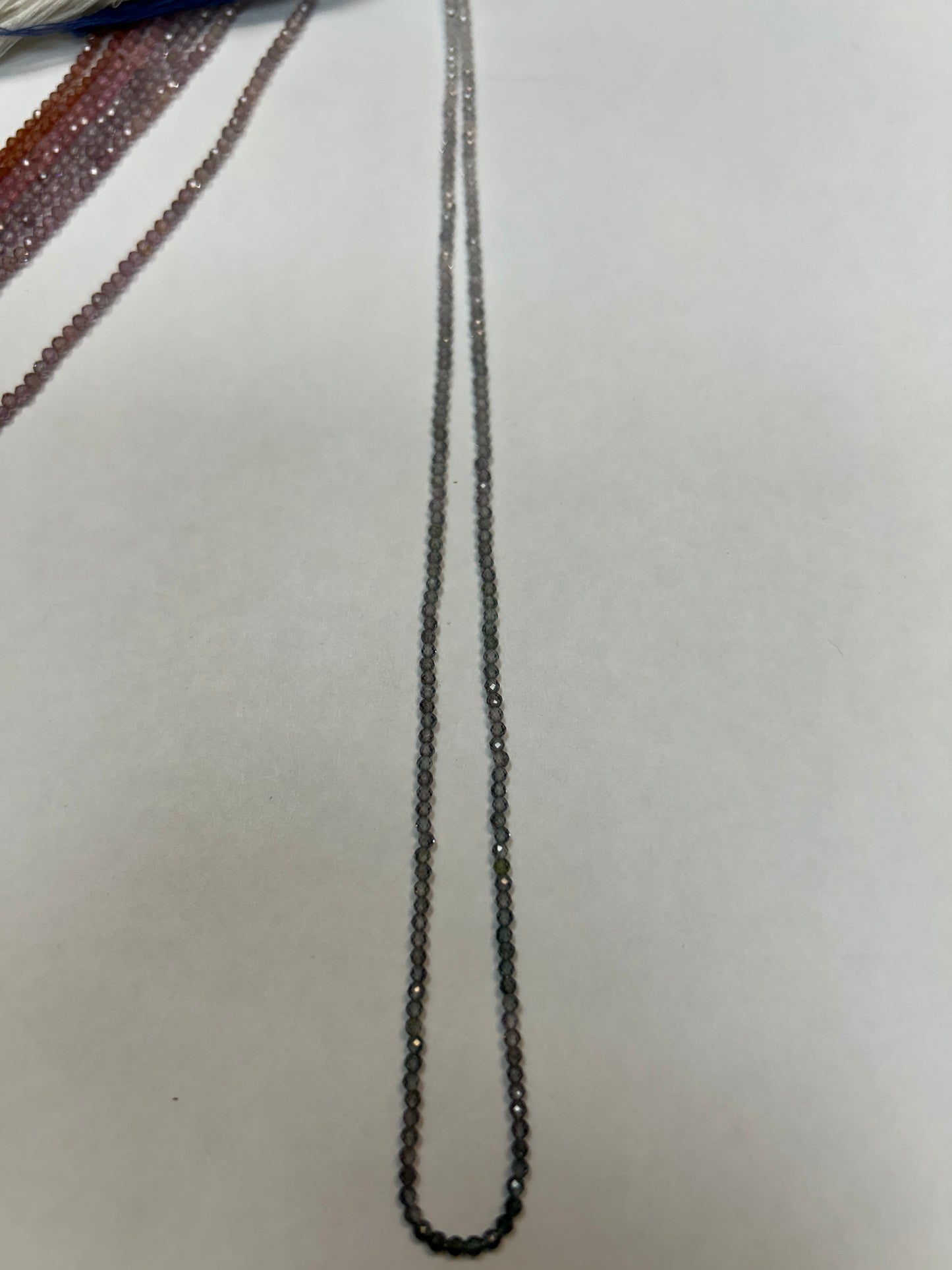 MULTI COLOR SPINEL ROUND FACETED 2-3MM