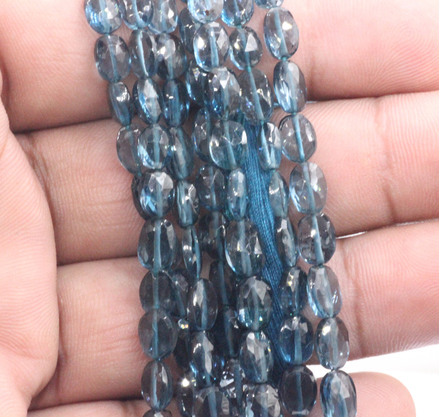 London Blue Topaz Faceted Oval Bead