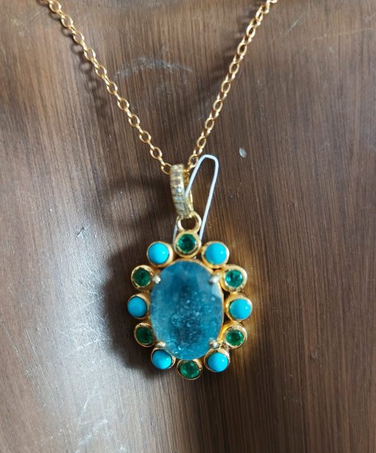 Oval Aquamarine stone pendant in 925 silver with pave diamonds, turquoise and emerald accents, 25x20 mm.