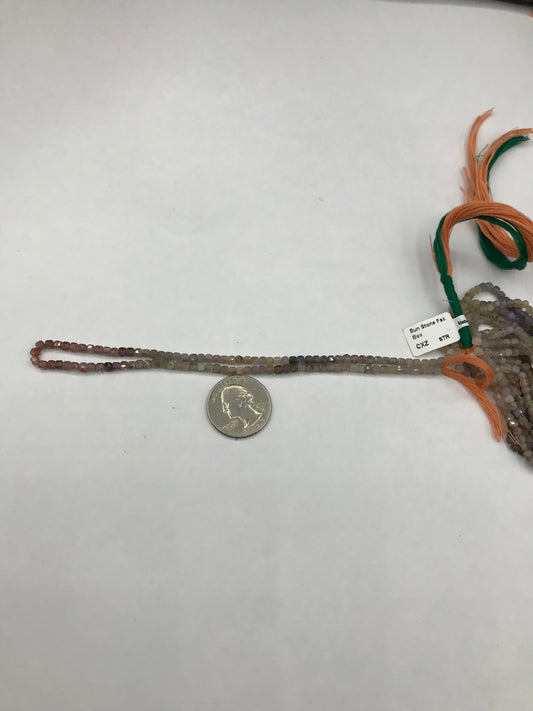 Sun Stone Faceted Square, Sunstone faceted box, faceted cube.