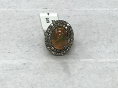 Oval Diamond Ring with Orange Gemstone