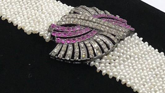 Designer Diamond and Ruby Bracelet over woven Pearls