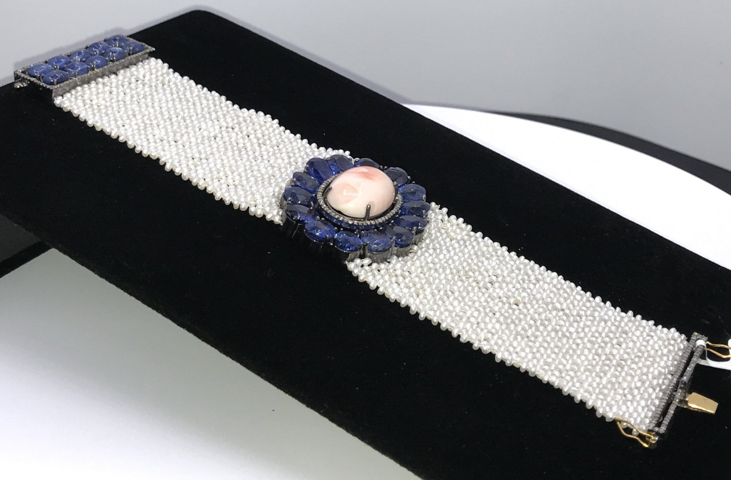 Coral and Kynite Designer Bracelet with Kynite and woven Pearls