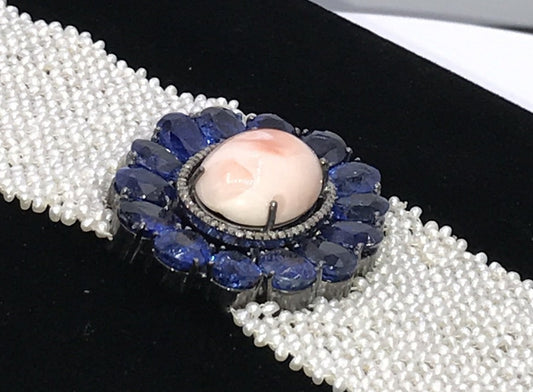 Coral and Kynite Designer Bracelet with Kynite and woven Pearls