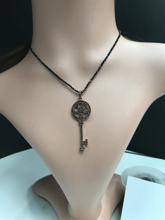 Key Shape Black Spinel Charm