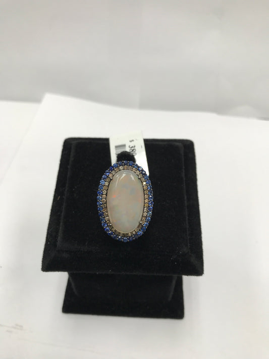 OPAL RING WITH DIAMOND AND BLUE SAPPHIRE