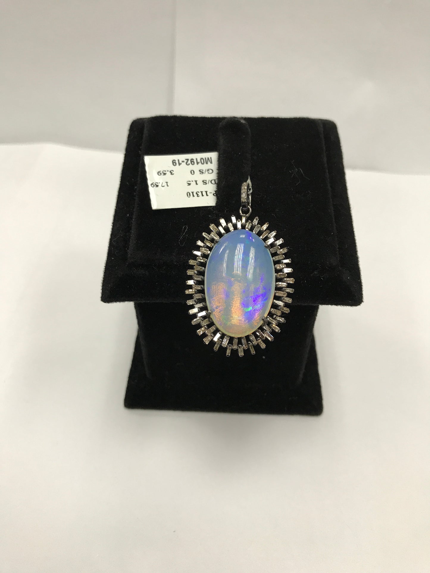 Oval Shape Opal and Diamond Pendant