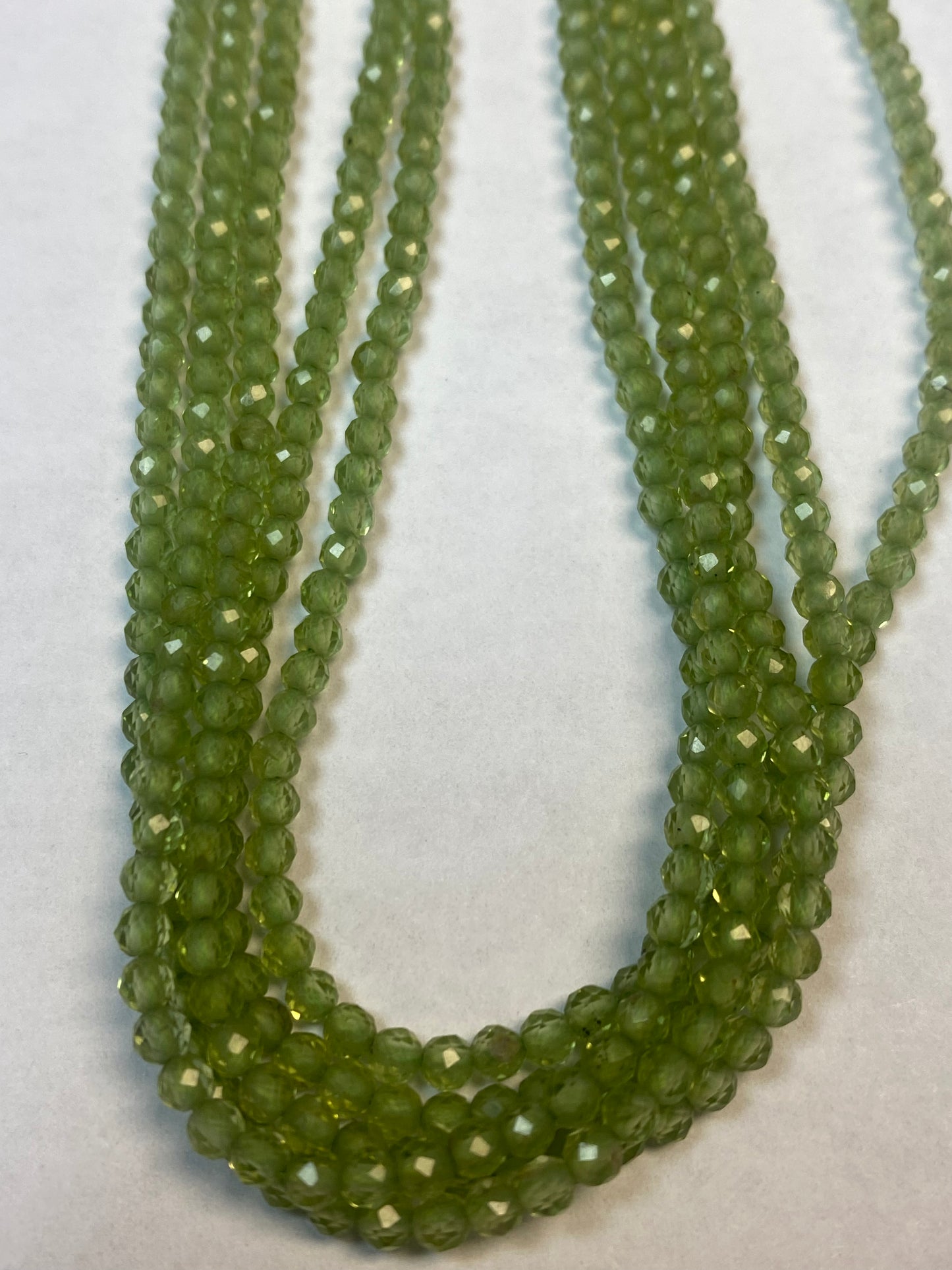 PERIDOT BEADS ROUND FACETED 3-4MM