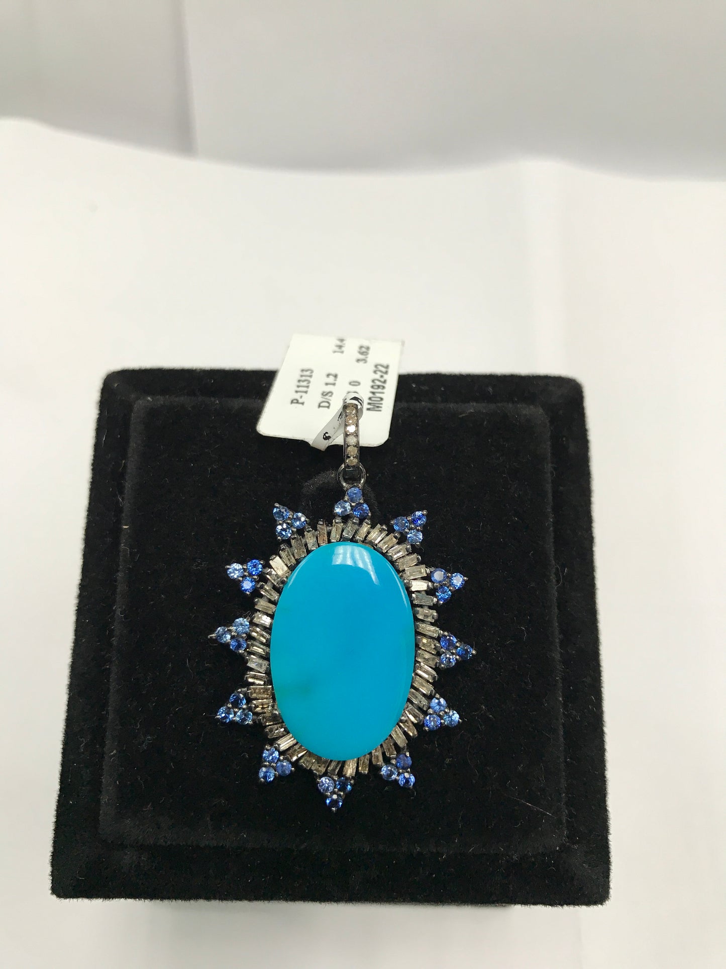 Oval spike blue pendant