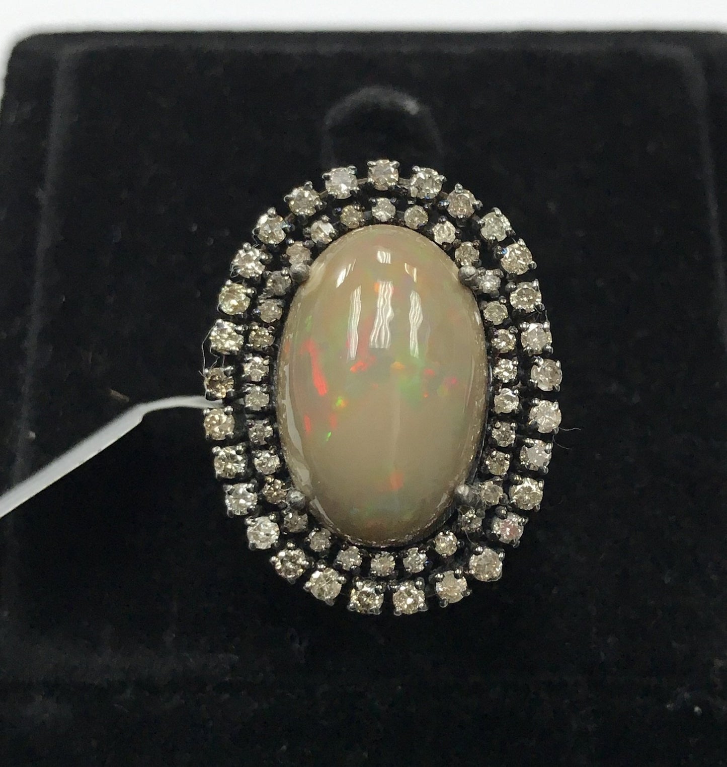 Oval Shape Opal smooth Cabochon and Diamond Ring
