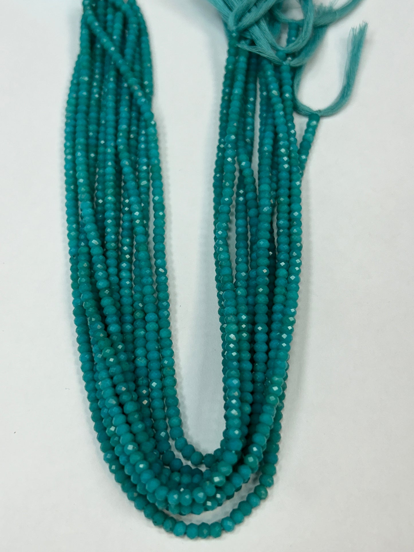 TURQUOISE BEADS ROUND FACETED 3-4MM