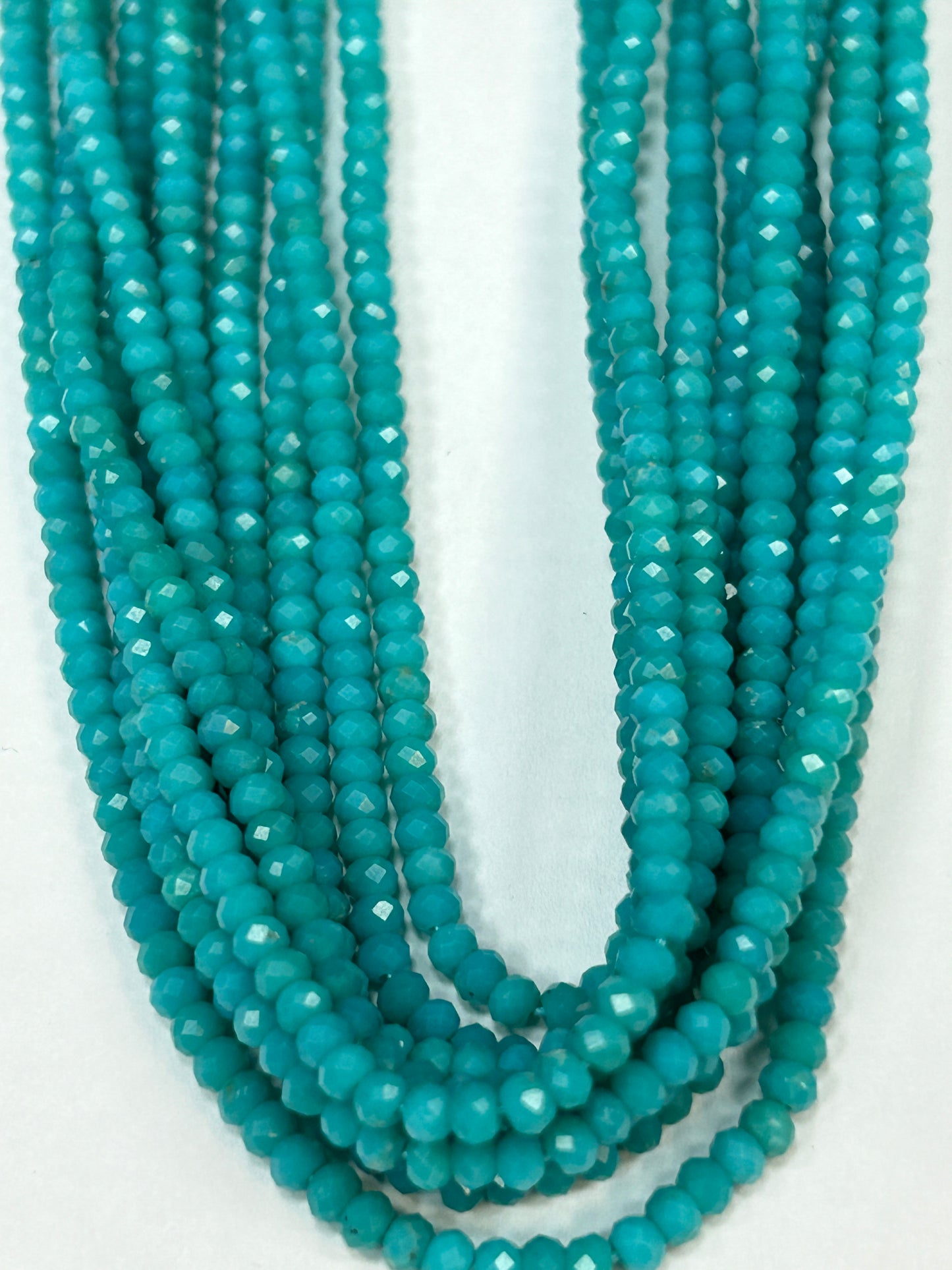 TURQUOISE BEADS ROUND FACETED 3-4MM