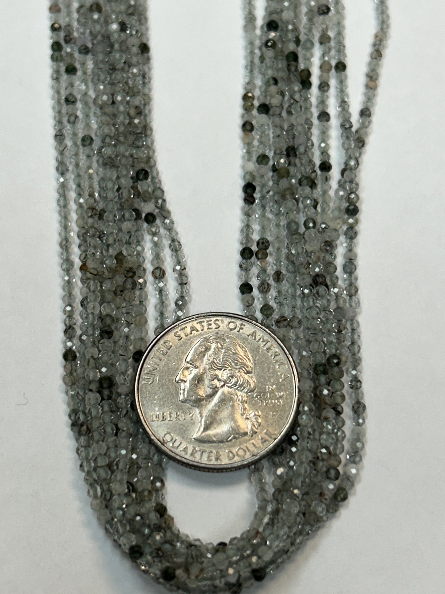 GREEN ROUTILATED QUARTZ ROUND FACETED 2-3mm