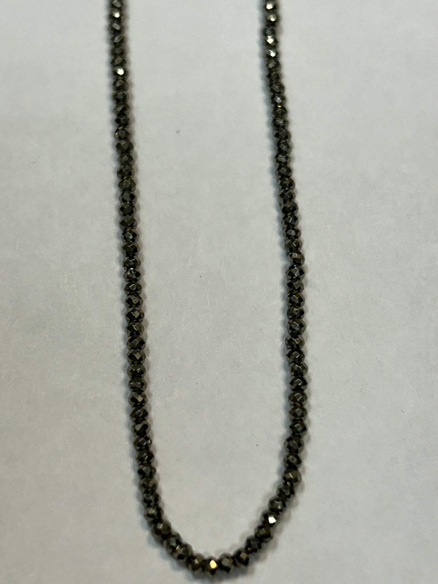 PYRITE ROUND FACETED 2-3mm