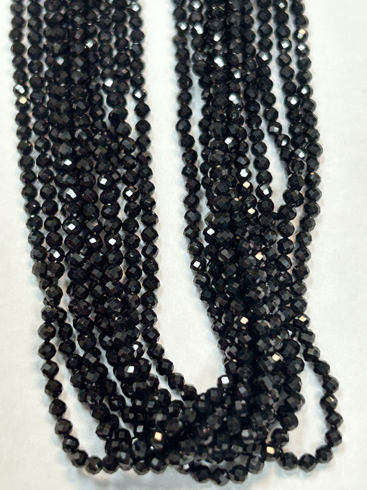 BLACK SPINEL ROUND FACETED 2-2.50 MM