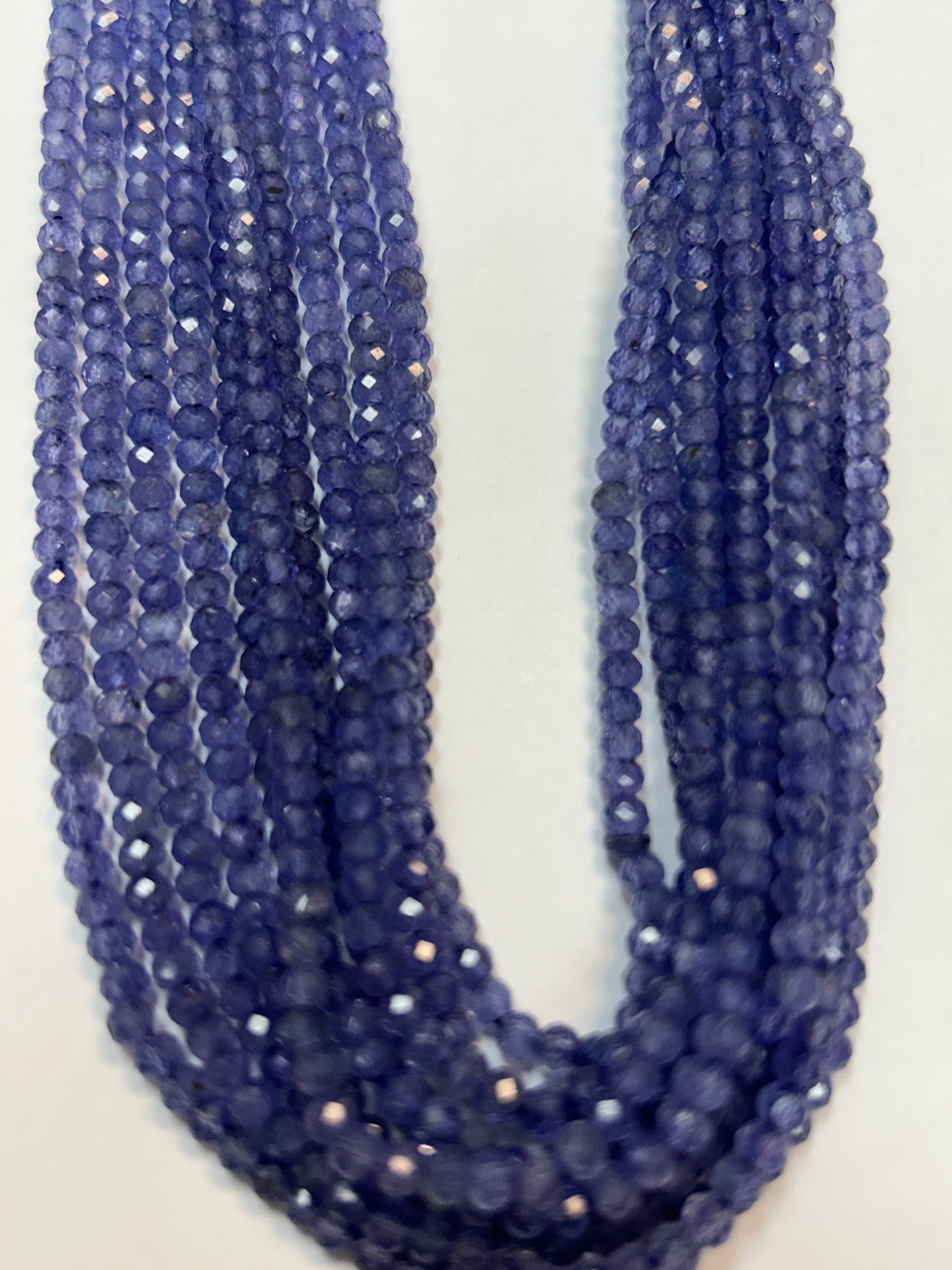 TANZANITE ROUND FACETED 3-4MM
