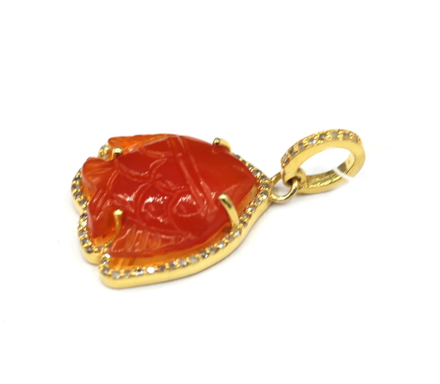 Fish-shaped sterling silver pendant with Orange jade centerpiece and diamond border