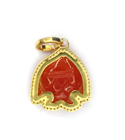 Fish-shaped sterling silver pendant with Orange jade centerpiece and diamond border