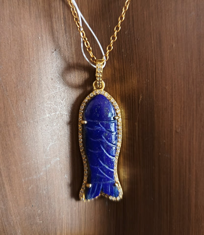 Fish-shaped sterling silver pendant with lapis lazuli centerpiece and pavé diamond border