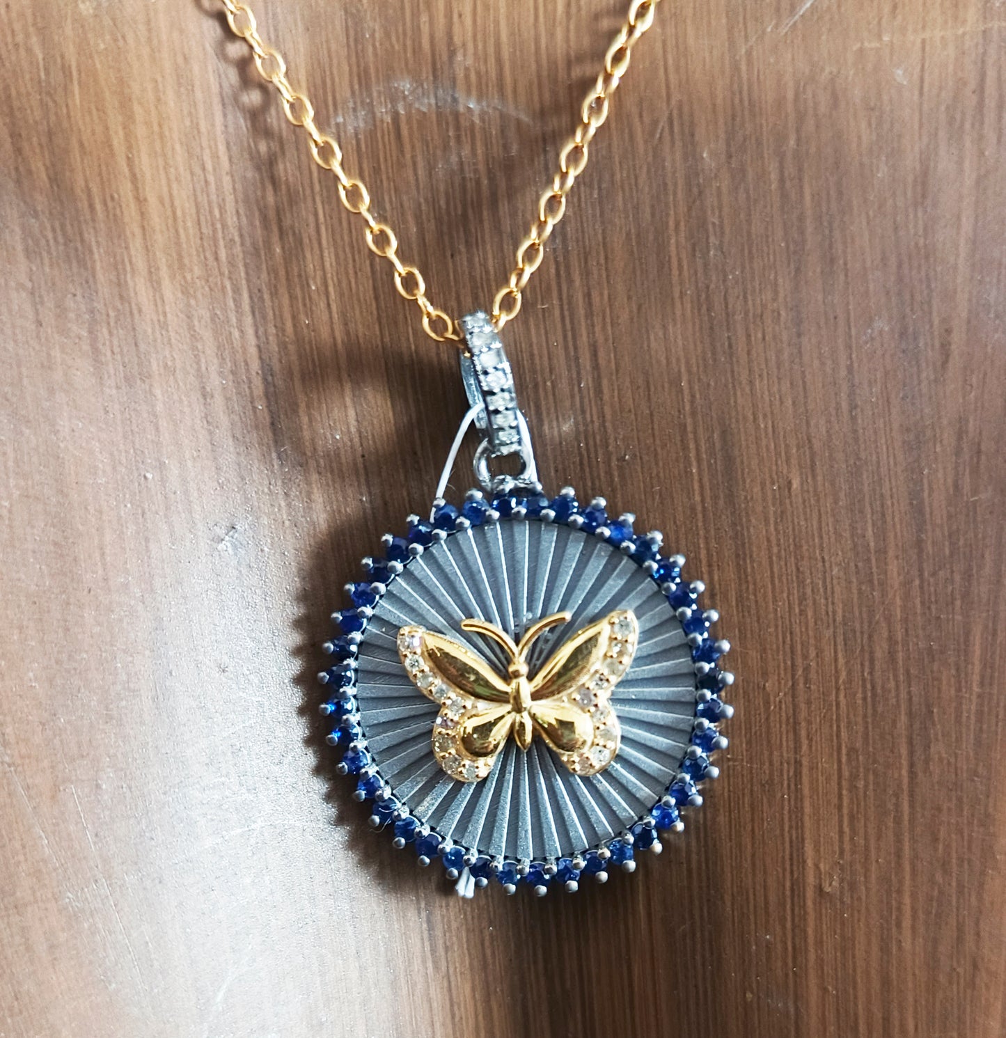 Round Disk On Butterfly pendant in 925 silver with Blue Sapphire And diamonds