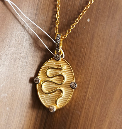 Oval Disk On Snake pendant in 925 silver with pave diamonds