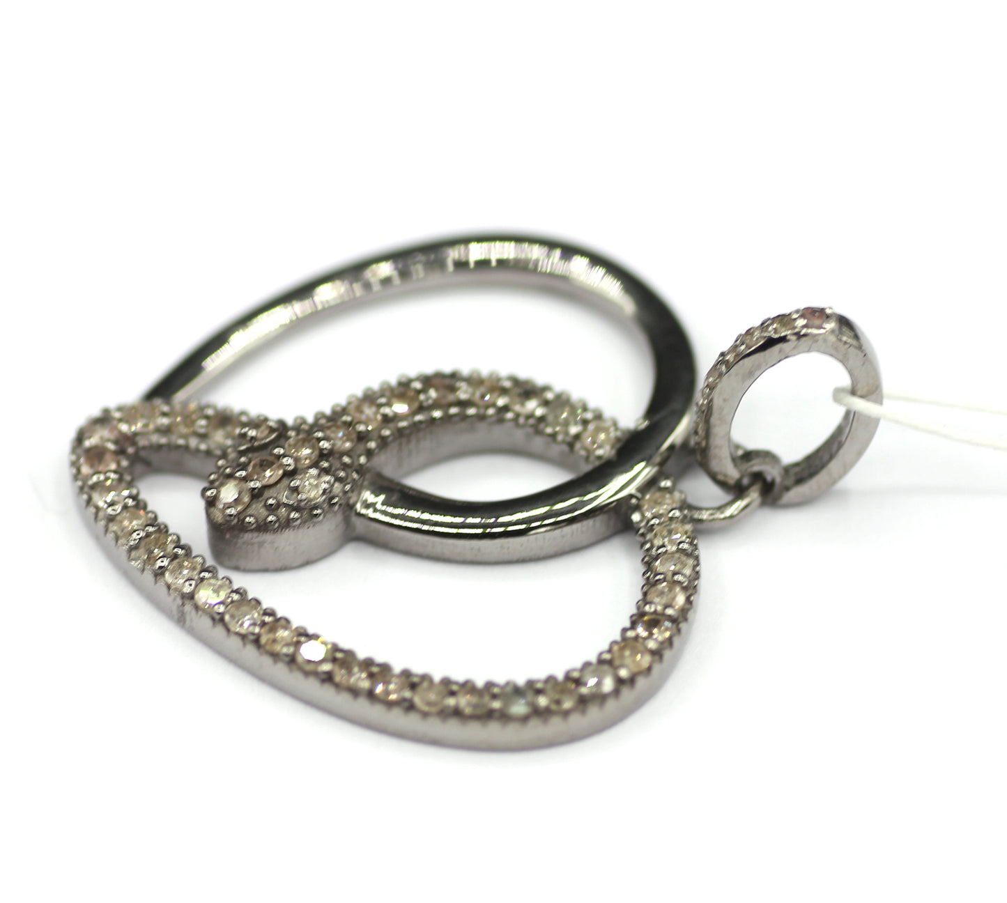 Heart shaped sterling silver pendant with Diamond
