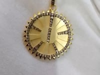 Round star pendant, 26 mm, 0.69 ct diamonds, 925 silver with gold-tone center