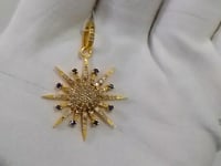 Star shaped sterling silver pendant with Diamond And Blue Sapphire
