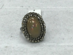 Oval Shape Opal smooth Cabochon and Diamond Ring
