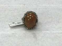 Oval Diamond Ring with Orange Gemstone