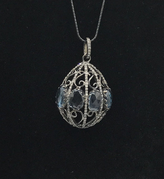 Diamond and London blue topaz drop pendant