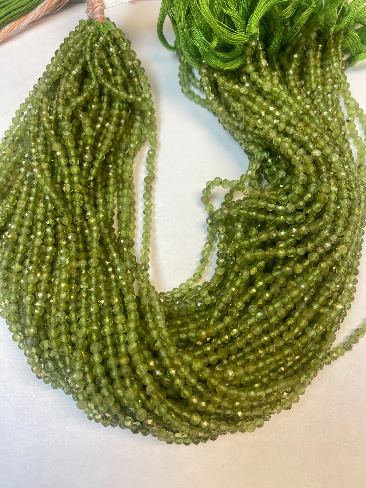 PERIDOT BEADS ROUND FACETED 3-4MM