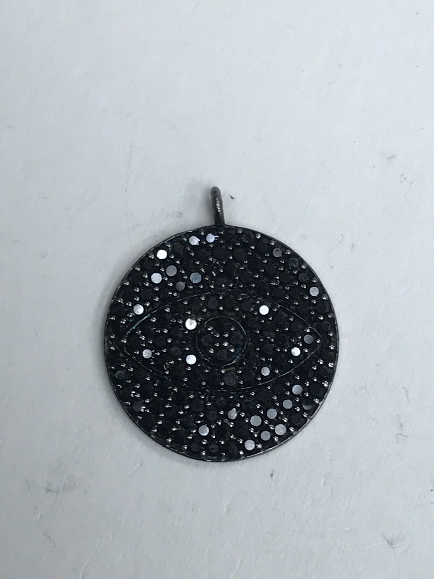 Overlap Circle Black Spinel Charm