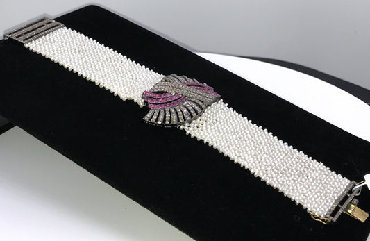 Designer Diamond and Ruby Bracelet over woven Pearls