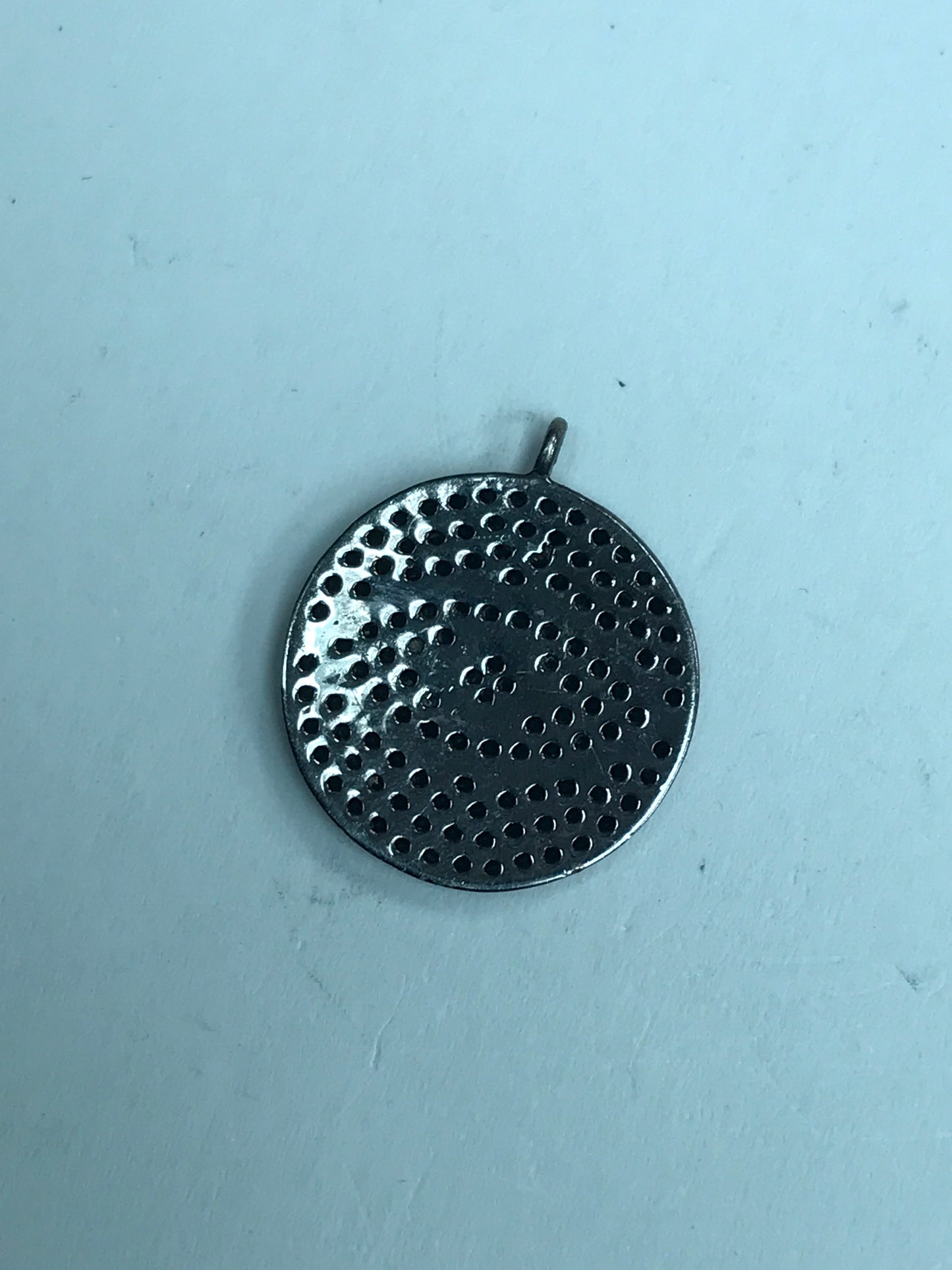 Overlap Circle Black Spinel Charm