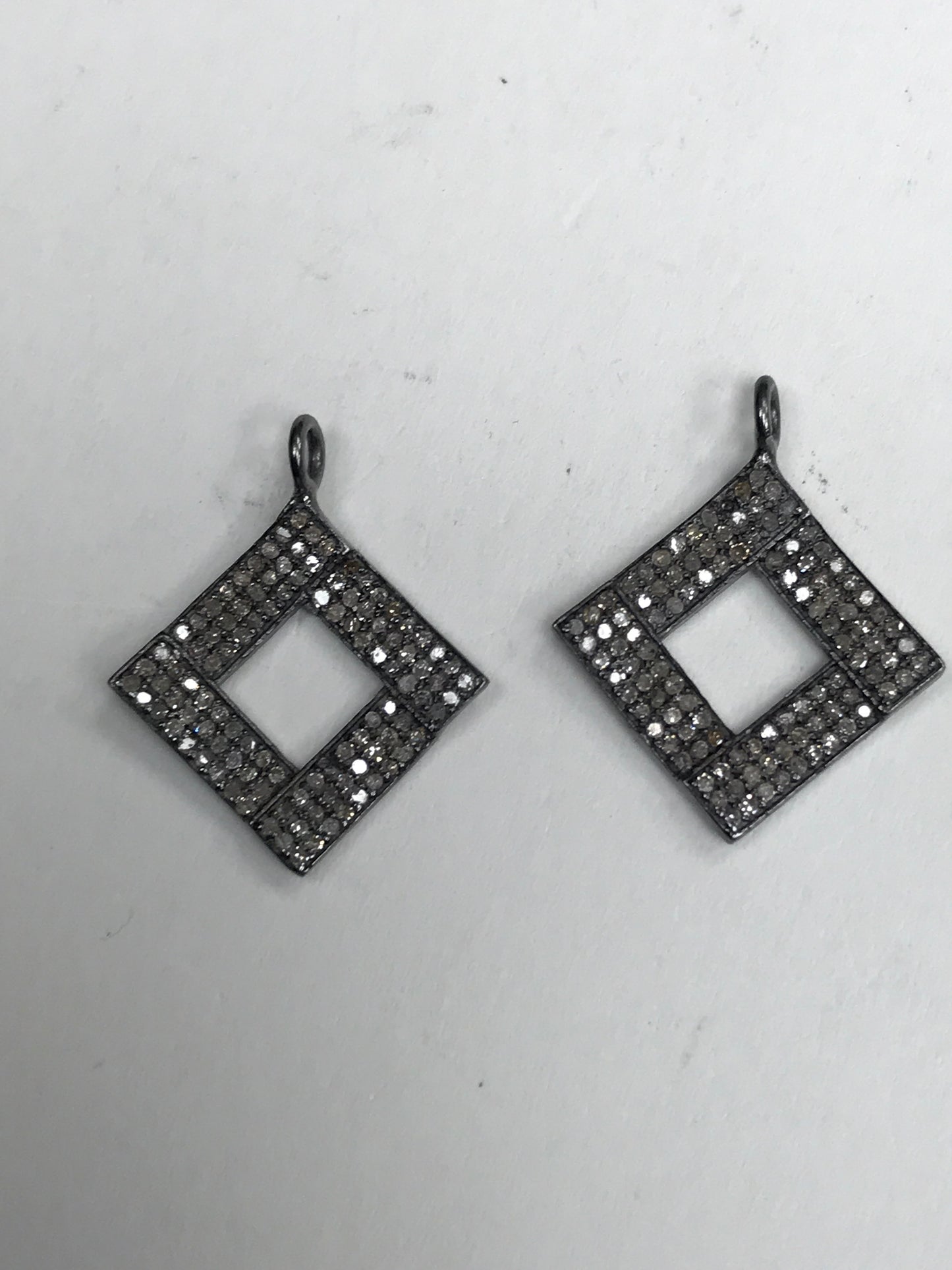 PENDANTS & CHARMS