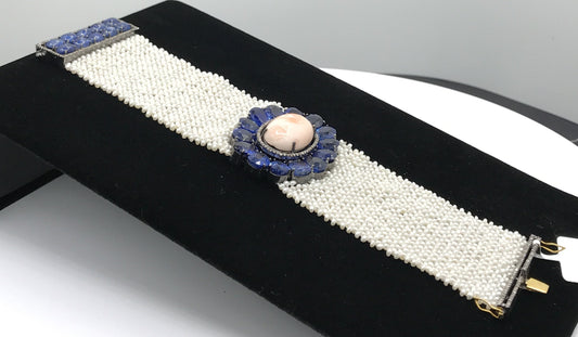 Coral and Kynite Designer Bracelet with Kynite and woven Pearls