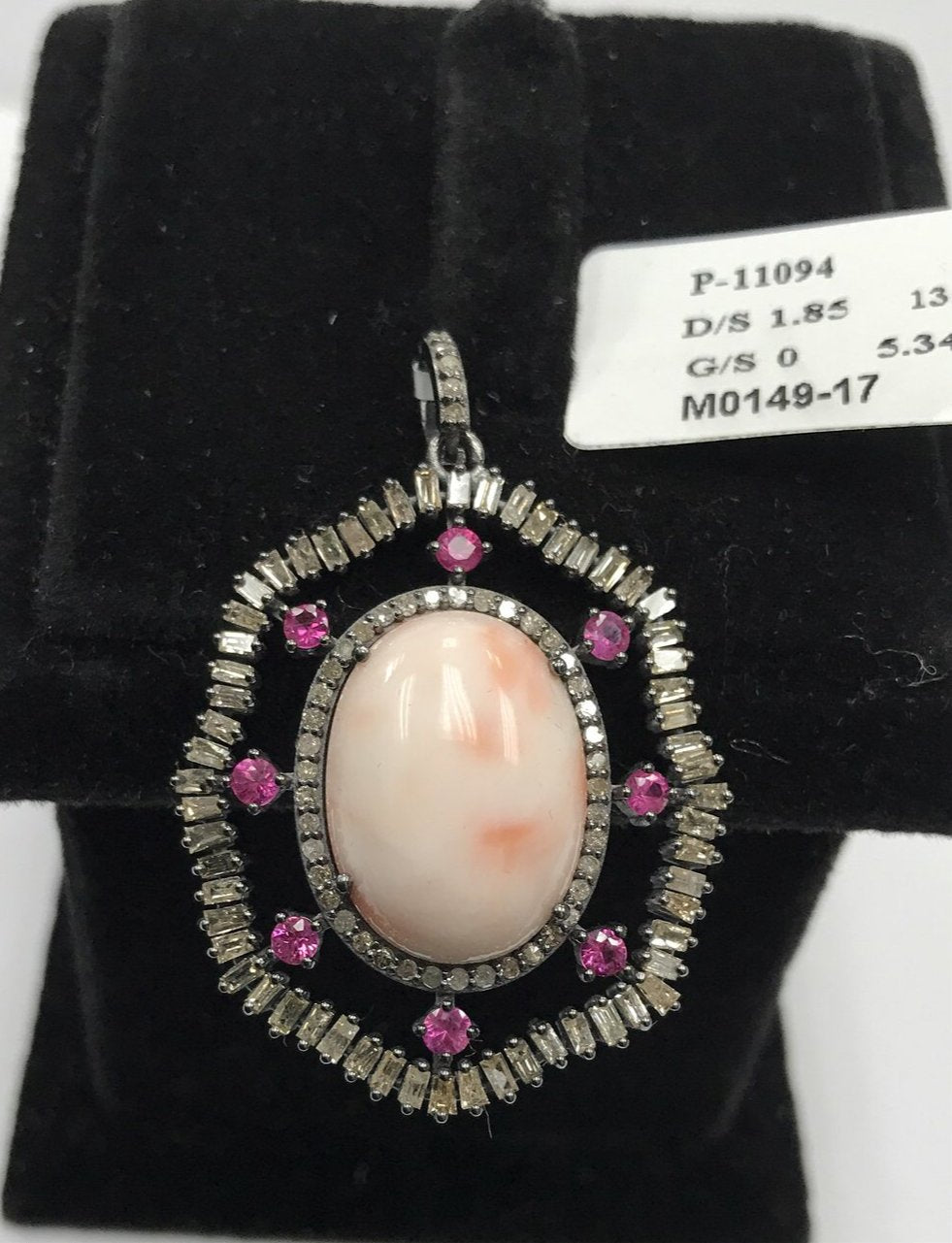 Pink Coral and Ruby studed with Diamond hand crafted over Sterling silver